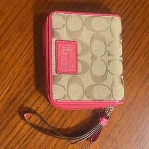 Coach Beige and Pink Wallet with zipper closure.  Used 2times.  Very clean!